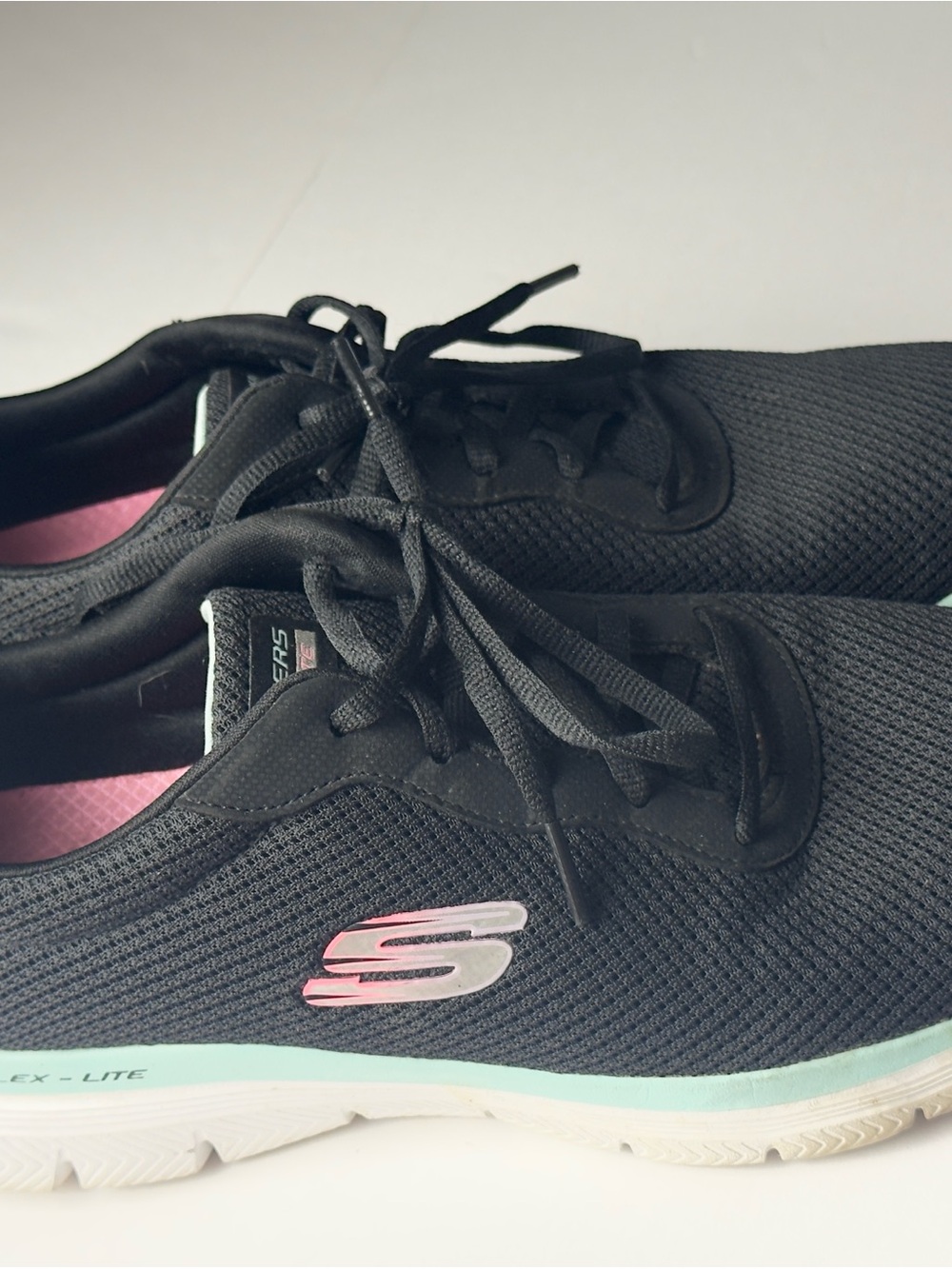 Skechers Black Athletic Sneakers with Pink Accents and Mint Midsole
